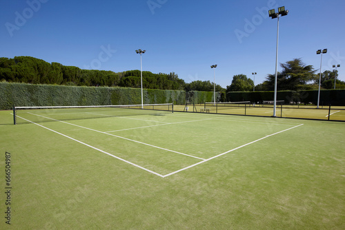 Open air tennis courts. Nobody. Copy space. Healthy lifestyle