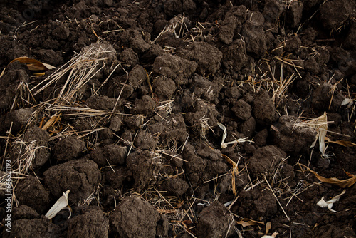 Earth, black soil, soil texture. Plowed land. Agriculture.