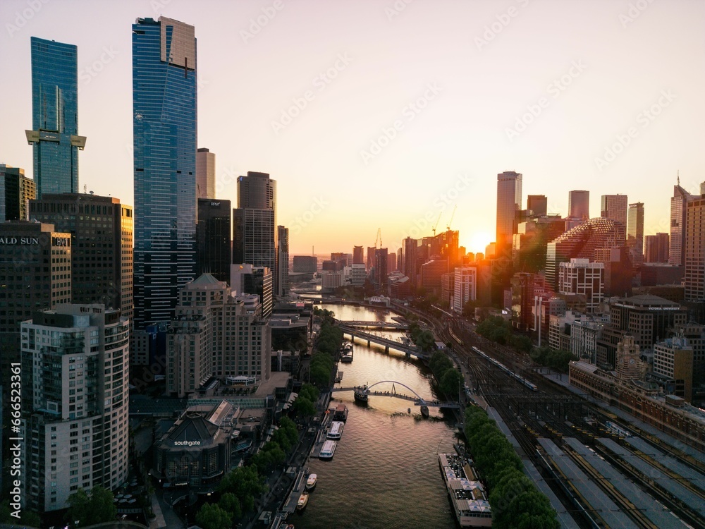 Fototapeta premium Aerial shot of the cityscape of Melbourne at sunset.