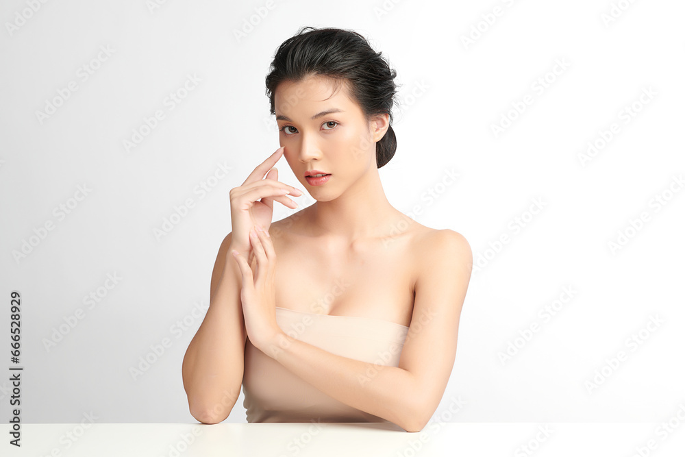 Beautiful young asian woman with clean fresh skin on white background, Face care, Facial treatment, Cosmetology, beauty and spa, Asian women portrait. Beautiful young asian woman with clean fresh skin on white background, Face care, Facial treatment, Cosmetology, beauty and spa, Asian women portrait.