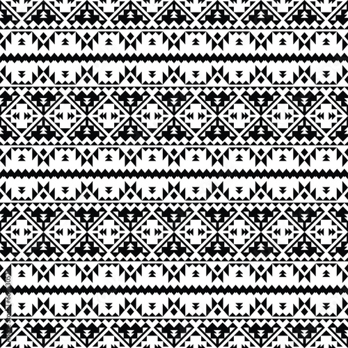 Seamless ethnic motif with traditional tribal texture design for textile and fabric. Geometric abstract vector illustration Aztec and Navajo style. Stripe pattern in black and white colors.