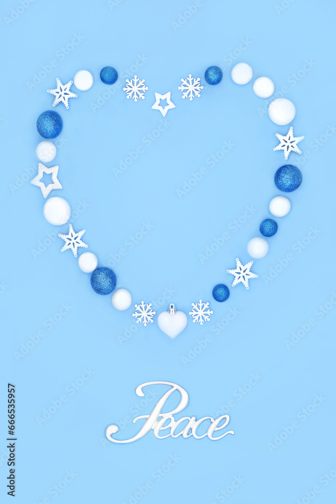 Obraz premium Christmas heart shape wreath with peace sign with snowflakes, stars and balls. Romantic symbol for holiday season on blue. Festive design for greeting card, menu, invitation, logo.