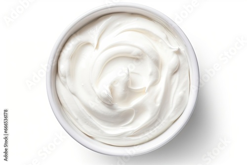 Top view of isolated Greek yogurt in white bowl