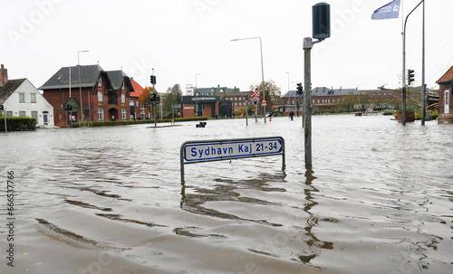 Flooded streets and houses in a Danish city under violent autumn storm surge