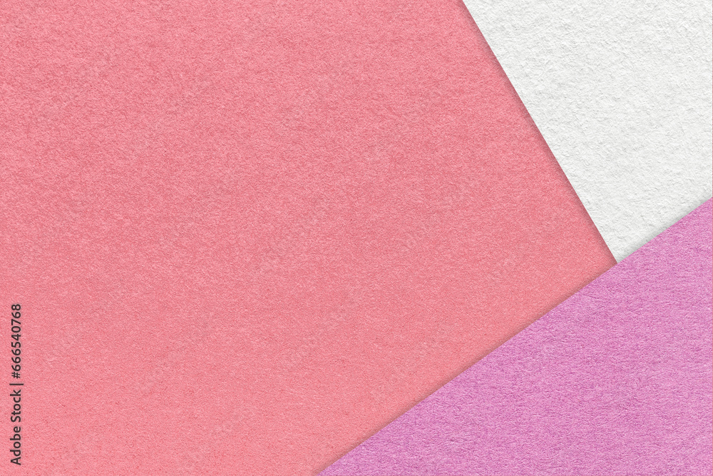 Texture of craft pink color paper background with white and lilac border. Vintage abstract rose cardboard.