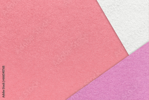 Texture of craft pink color paper background with white and lilac border. Vintage abstract rose cardboard.