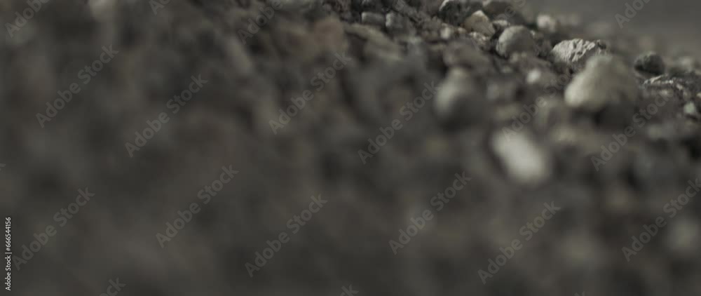 soil slowmotion moving falling and bouncing with dust and particles