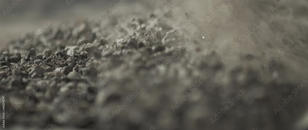 soil slowmotion moving falling and bouncing with dust and particles