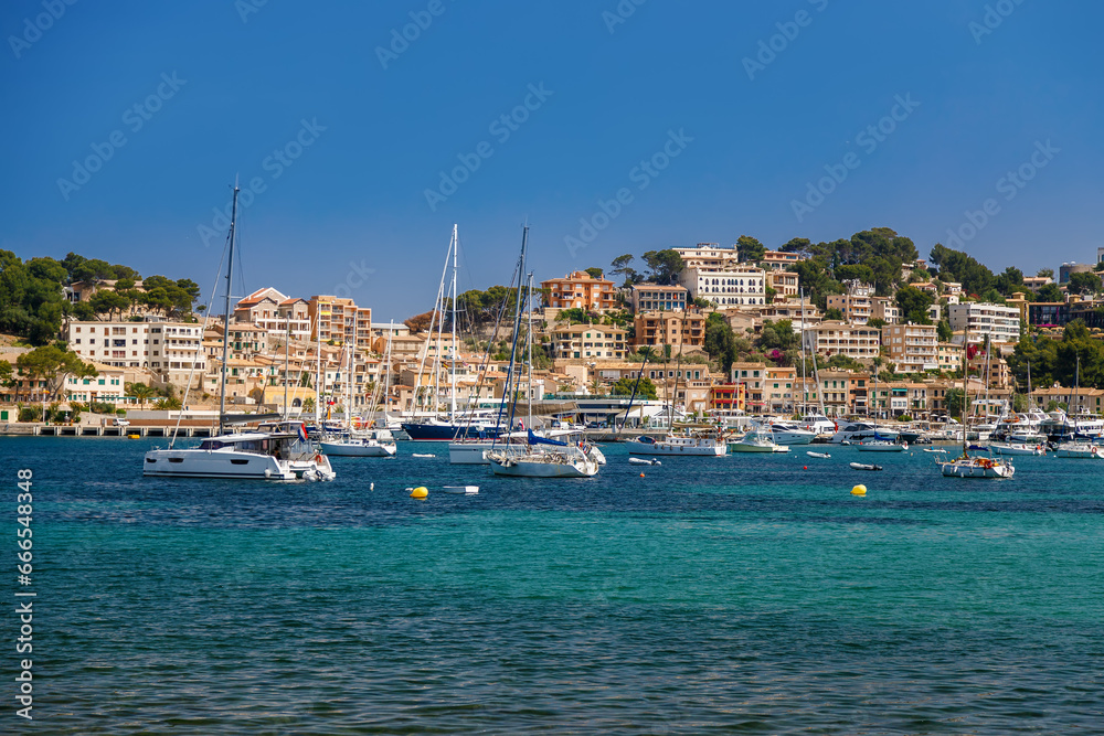 Beautiful view with yachts floating in Port de Soller's bay in Mallorca
