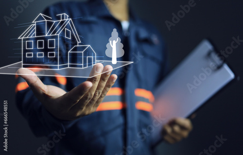Draft house design drawing line holding by engineer hand represent to construction control by professional team and building a quality residential to complied in standards.