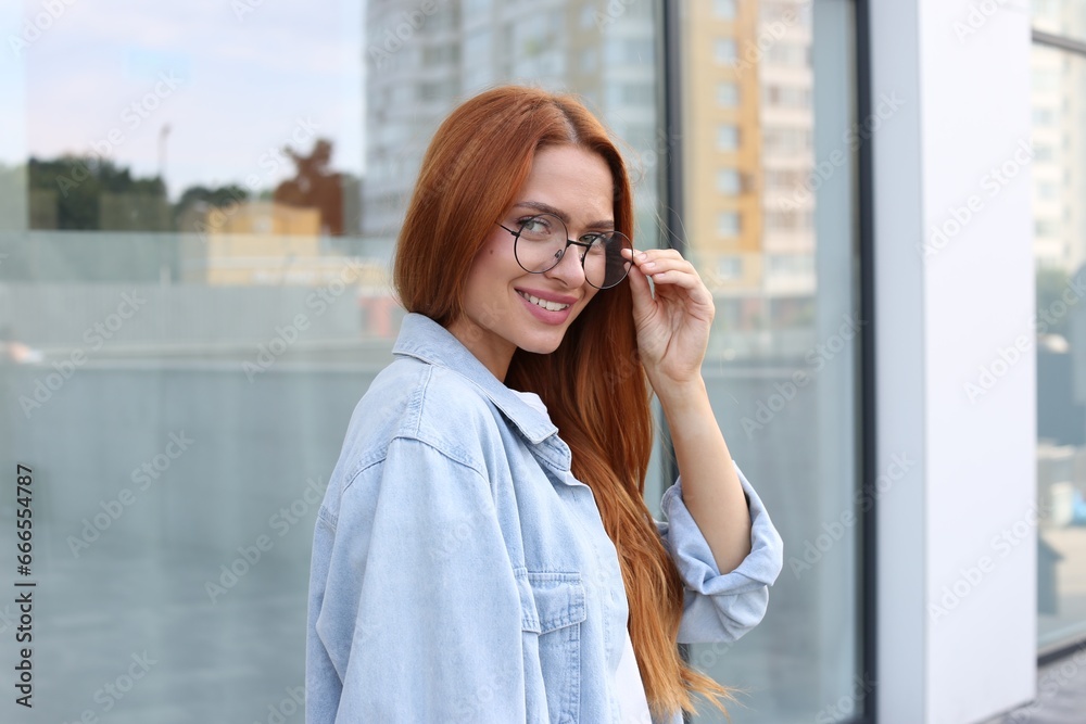 Portrait of beautiful woman in glasses outdoors Portrait of beautiful woman in glasses outdoors