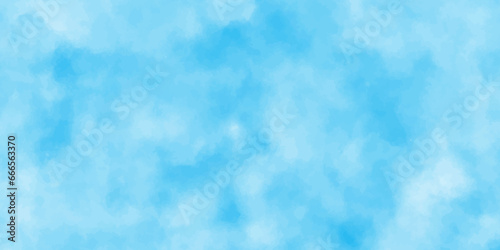 Blue sky is surrounding with tiny white clouds, soft and lovely sky blue watercolor background with clouds,small and large clouds alternating and moving slowly on cloudy winter morning blue sky,,