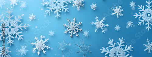 Cristal snowflakes on snow - Christmas and Winter background - Natural snowdrift close up with abstract blue lighting blurred background