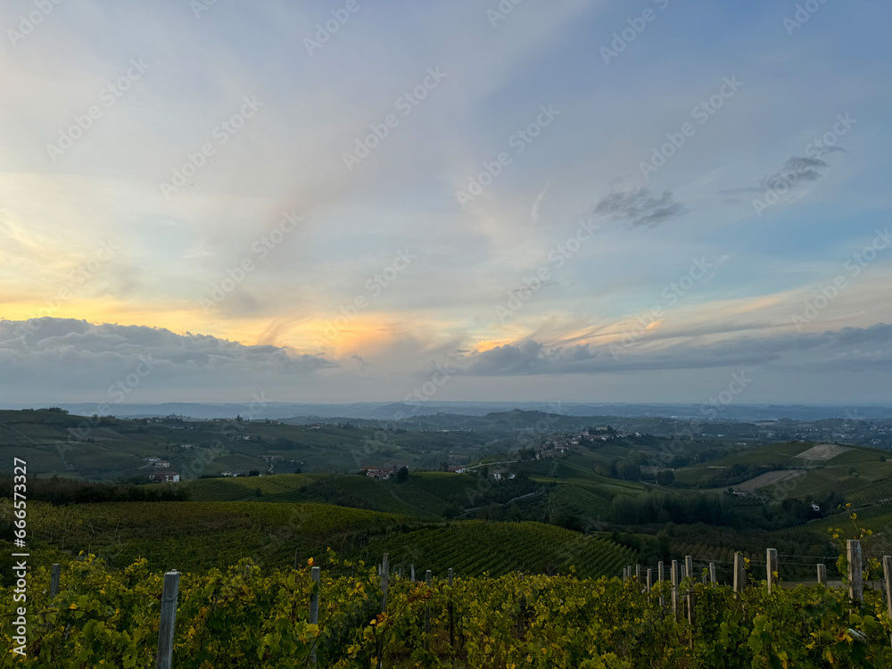 Italian landscape in Langhe and Monferrato, vineyards are visible on the hills. Italian landscape in Langhe and Monferrato, vineyards are visible on the hills.