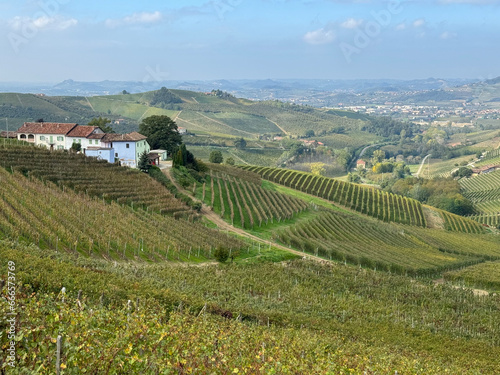 Italian landscape in Langhe and Monferrato, vineyards are visible on the hills.