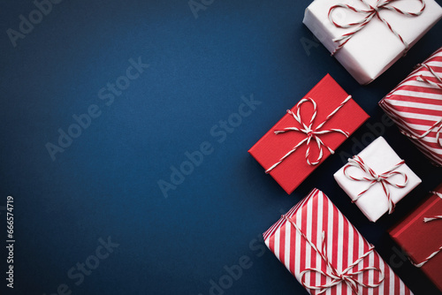Gift boxes on color background, flat lay, space for text