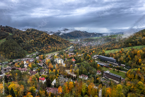 Szczawnica is a spa town in Poland,on the border of the Pieniny and Beskid Sądecki mountain ranges.  Dunajec River, the charming Grajcarek stream, aerial drone view, autumn landscape photo