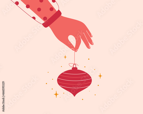 Female hand holds red xmas tree toy. Festive decoration ball in human arm. Elegant woman shares Christmas bauble. New year concept or design. Vector illustration