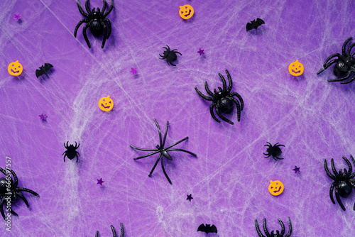 Happy Halloween banner mockup, pumpkins, bats and spiders on purple background