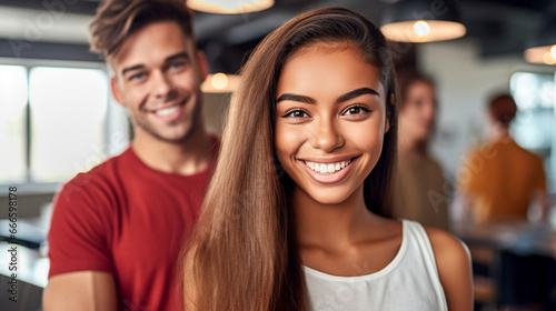 smiling young woman and her boyfriend or husband or best friend, at home at daytime, at social event, happiness and positivity, positive and lively atmosphere