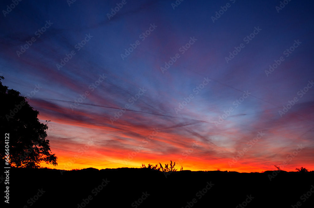 Sunrise against the background of sky and clouds