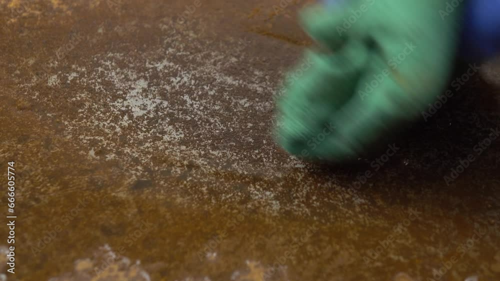 Cleaning surface of sheet of metal from a layer of rust with citric acid solution  for reuse, primary rust removal