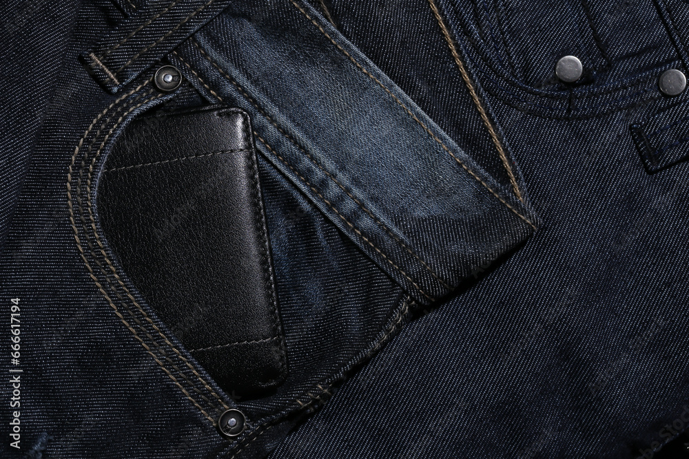 Closeup to man, jeans with wallet in pocket. Closeup to man, jeans with wallet in pocket.