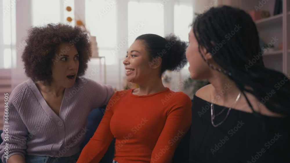 African American woman telling about engagement to best friends, feeling happy African American woman telling about engagement to best friends, feeling happy