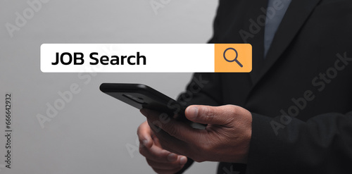 Job search concept, find your career, man using smartphone with online website to search photo