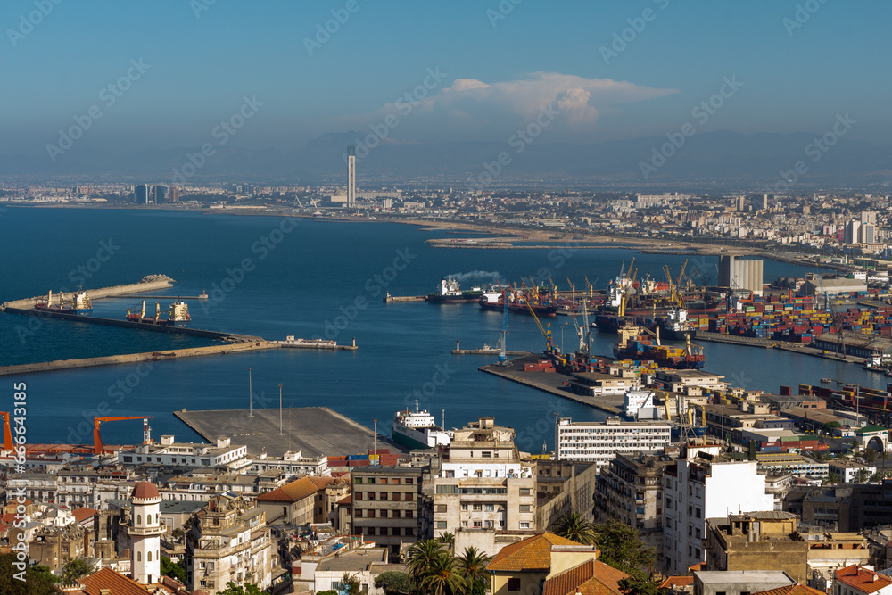 Algiers, Alger, Algeria, 10 19 2023 : Beautiful panorama of the bay of Algiers, with the industrial port and the Djamaa El-Djazaïr (English : Great Mosque) in the background.