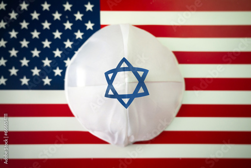 Israeli kippah on the US flag. The Jewish community in country.