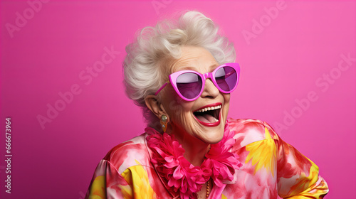 Happy mature woman wearing pink sunglasses and a flower necklace