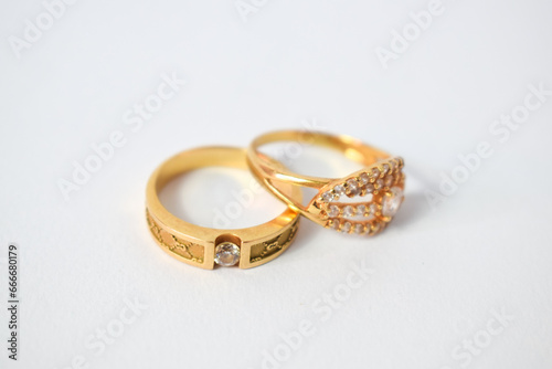Close Up Golden ring with diamond on isolated white background