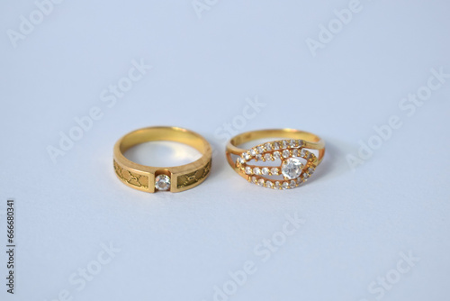 Close Up Golden ring with diamond on isolated white background