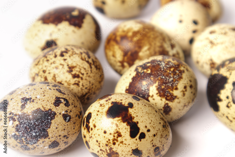 Quail eggs isolated on white background. Healthy food concept. Selective focus. Quail eggs isolated on white background. Healthy food concept. Selective focus.
