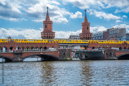 View of Oberbaum Bridge near Eastside section of the former Berlin Wall along the Spree River, Berlin, Germany photo