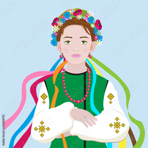 Ukrainian girl in national costume with garland