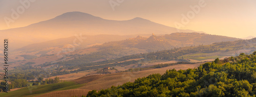 View of landscape in the Val d' Orcia near San Quirico d' Orcia, Province of Siena, Tuscany photo