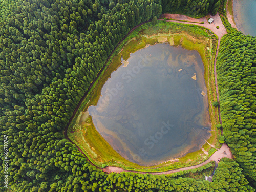 Aerial view of Lagoa Empadadas lake and some pine trees, Sao Miguel island, Azores islands, Portugal, Atlantic photo