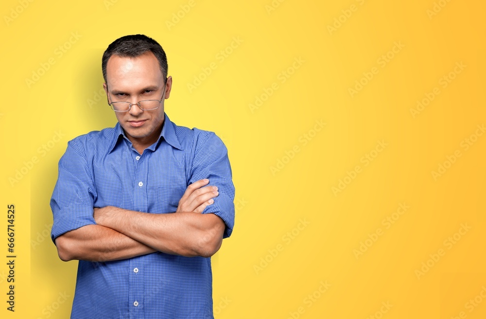 Young happy man standing over color background Young happy man standing over color background