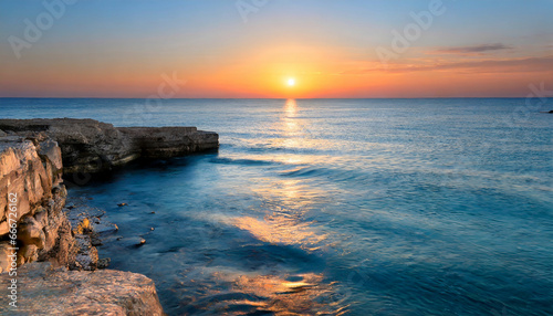 Tranquil Sunset A Golden Glow Over Blue Waters