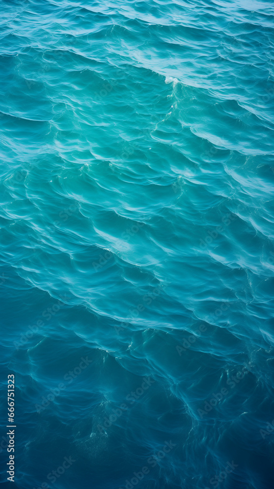 Deep blue waves, mesmerizing ocean patterns, sunlight reflections, soothing marine backdrop, nature's elegance.