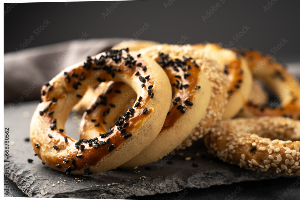 Turkish snack kandil bagel on black background - obrazy, fototapety, plakaty 
