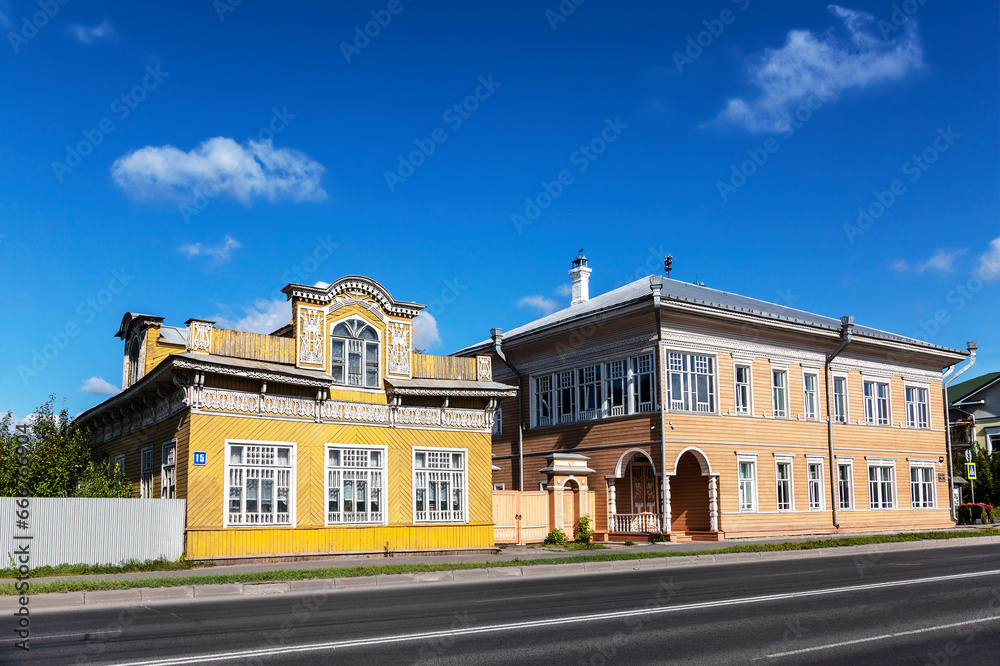 Vologda. View of the houses - monuments of wooden architecture: the house of Uncle Gilyay (Zernov 's house) and the house of Chernoglazov on Chernyshevsky Street. Russia Vologda. View of the houses - monuments of wooden architecture: the house of Uncle Gilyay (Zernov 's house) and the house of Chernoglazov on Chernyshevsky Street. Russia