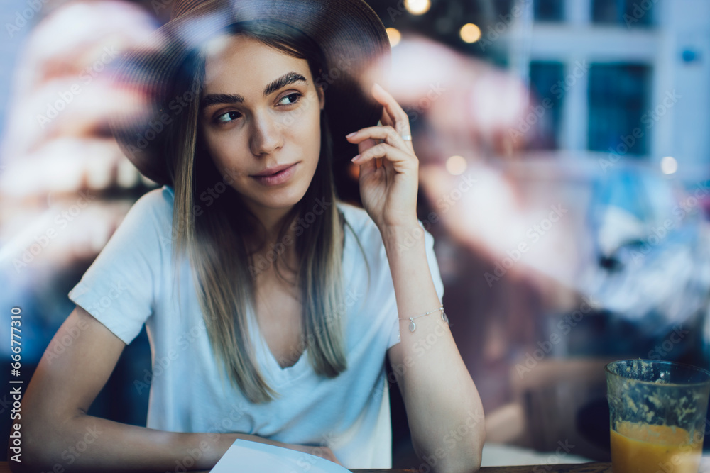 Attractive female student chilling in cafe Attractive female student chilling in cafe