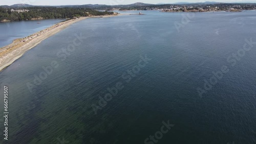 Victoria British Columbia Canada, July 16 2023: High aerial Esquimalt Lagoon sand spit overlooking Fort Rod Hill and shipyards at background.
 photo