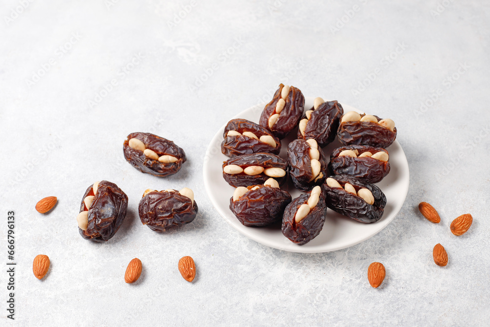 Obraz premium Fresh organic and various sweet dried date fruits.