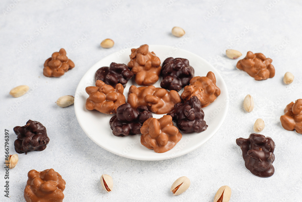 Handmade chocolate with pistachios, dark and milk chocolate pieces. Handmade chocolate with pistachios, dark and milk chocolate pieces.