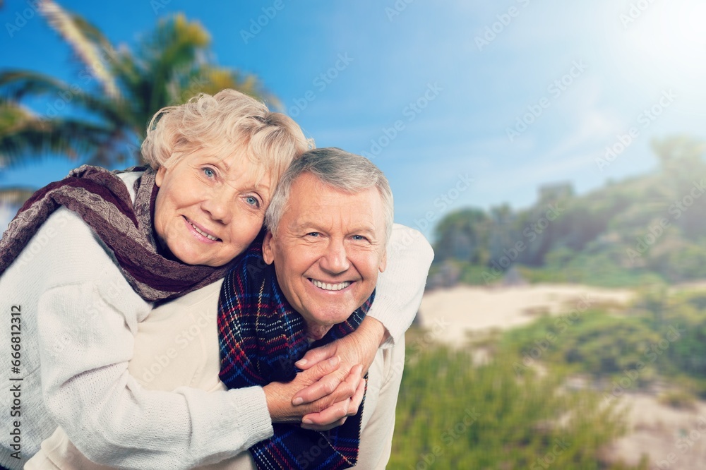 Senior happy couple have fun on the beach Senior happy couple have fun on the beach