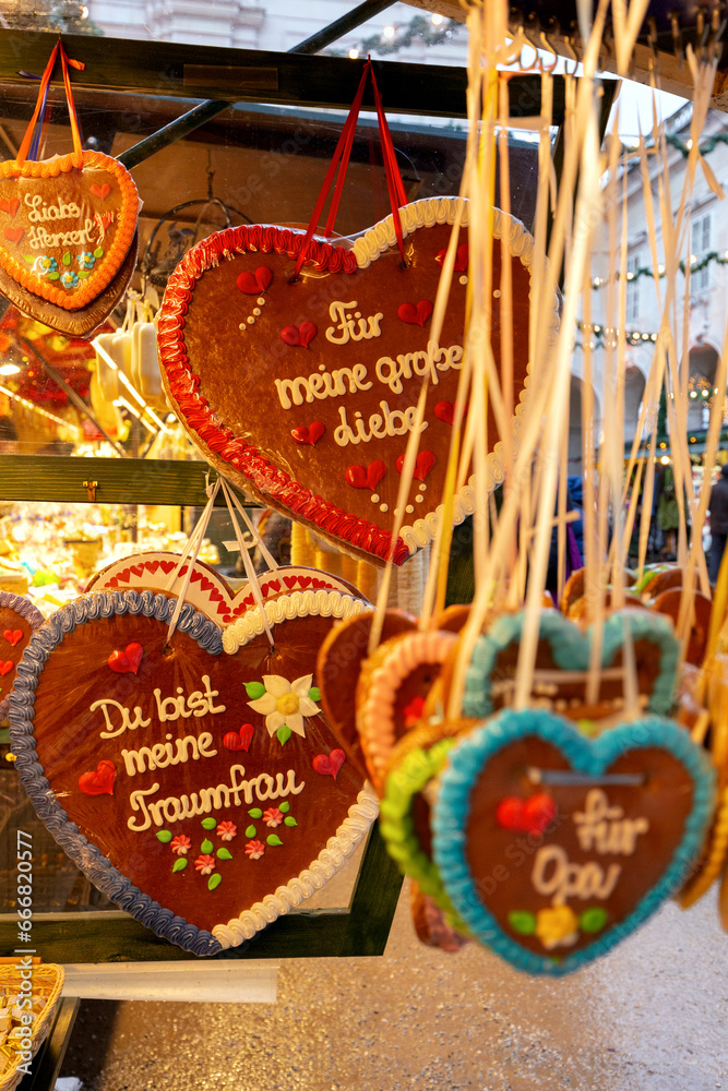 Large Christmas gingerbread cookies on a market stall in Salzburg.